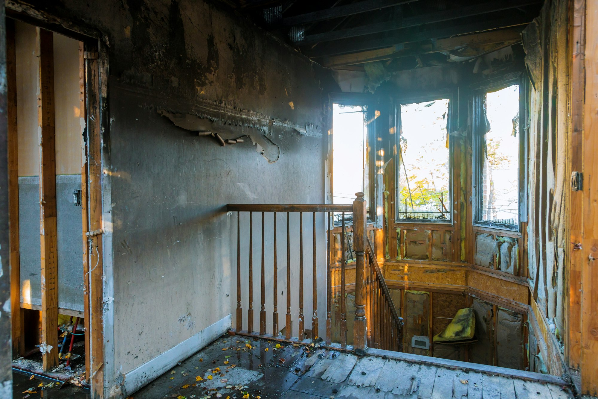 Burned house interior after fire room inside of damaged apartment after burned